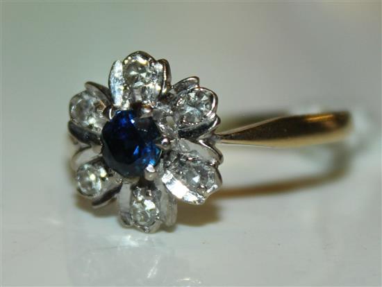 An 18ct gold, sapphire and diamond cluster ring, size Q.